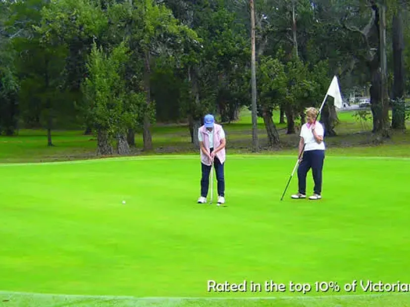 Golfers on the putting green at Yarram Golf Club